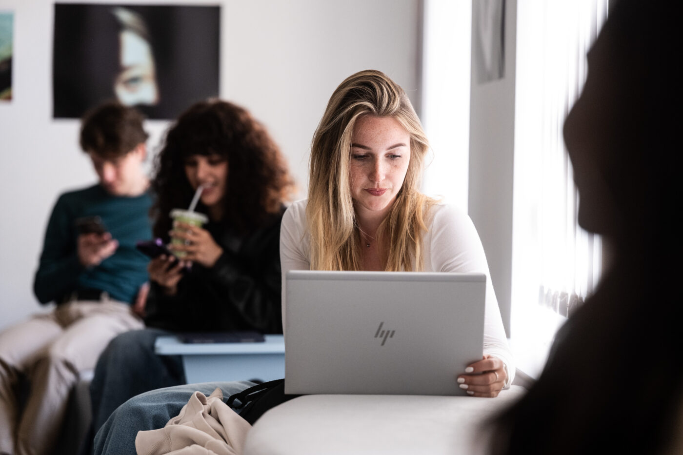An English Literature student revises some notes before an exam