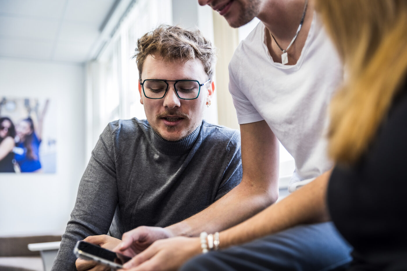 Two Business Analytics Master's students at UNYP in Prague evaluate and discuss how to execute a mobile app focused assignment